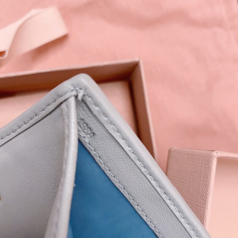 Replica Miu Miu Pocket Wallet Light Blue 4 Replica Miu Miu Pocket Wallet Light Blue - realistic designer-inspired fake bag